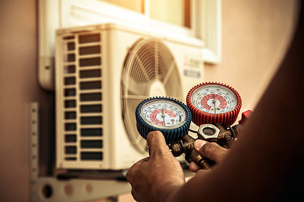 Professional Air Conditioning Service technician working in La Crescenta, CA